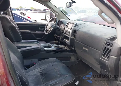 2015 Nissan Titan Pro-4X z USA, uszkodzony, nr VIN 1N6BA0EC8FN506760